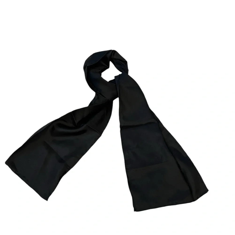 NWOT unbranded oblong black silk scarf with rolled edges, excellent quality